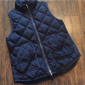 Navy quilted puffer vest